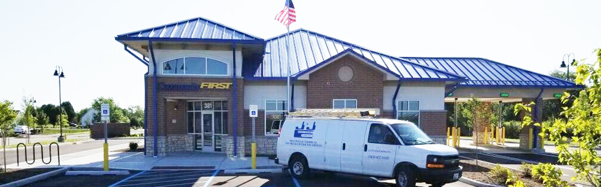 J & J Electric of Indiana Van in Front of Community First Bank