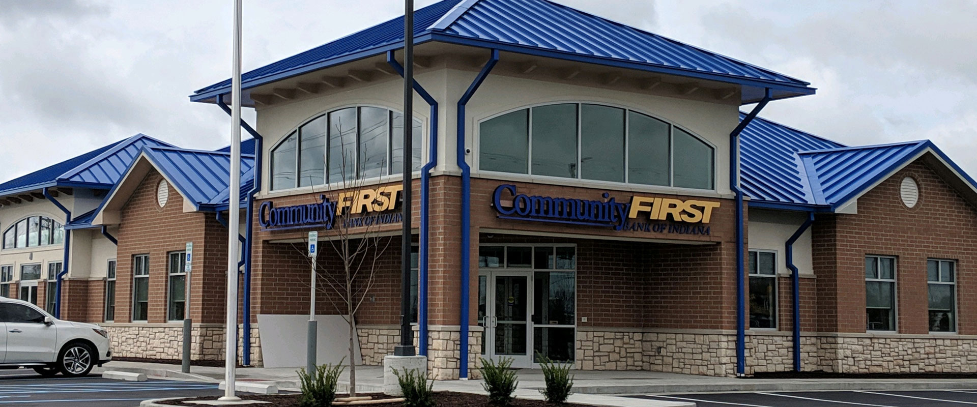 J & J Electric of Indiana Van in Front of Community First Bank